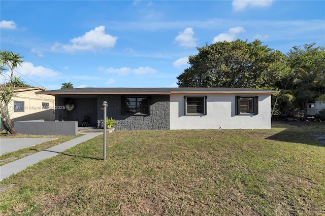 single story home featuring a front yard