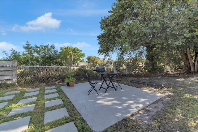 view of patio / terrace with fence