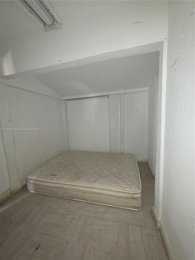 unfurnished bedroom with a closet