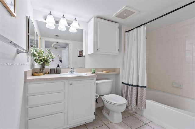 bathroom with vanity, visible vents, tile patterned floors, toilet, and shower / tub combo with curtain