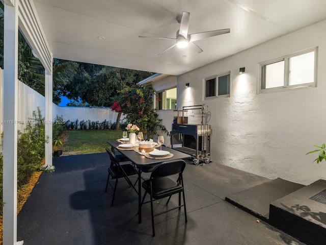 view of patio / terrace with a fenced backyard and ceiling fan