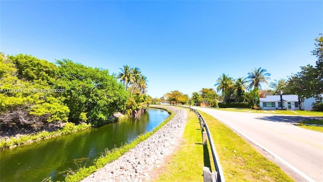 view of road with a water view