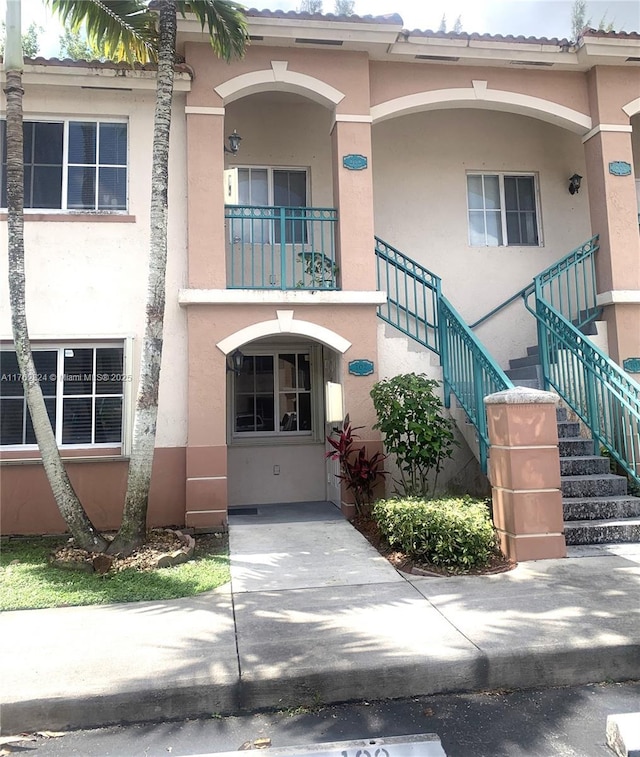 view of property with stairs