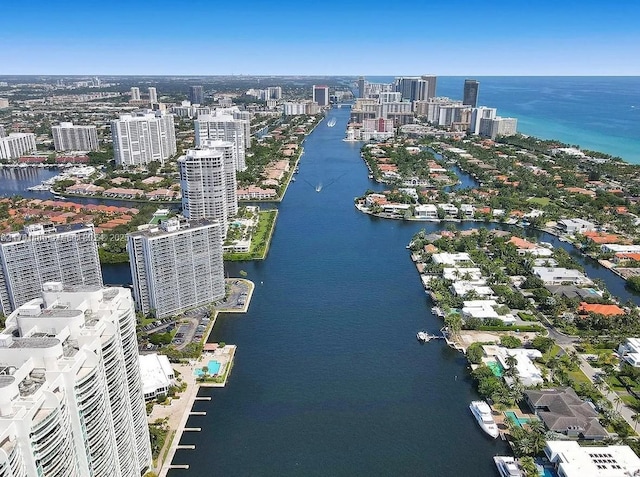 bird's eye view featuring a city view and a water view