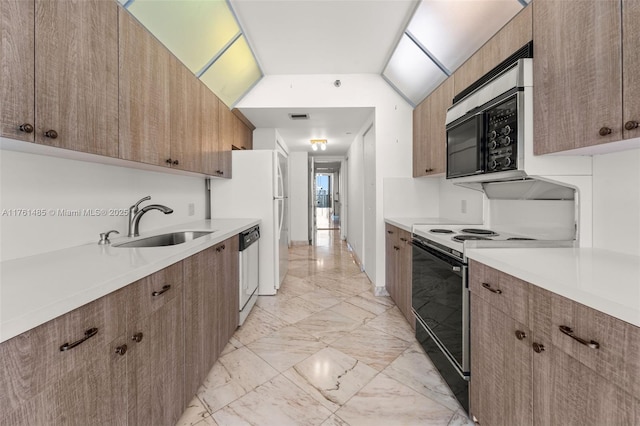 kitchen featuring a sink, electric range, marble finish floor, and dishwasher