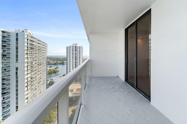 balcony with a city view and a water view