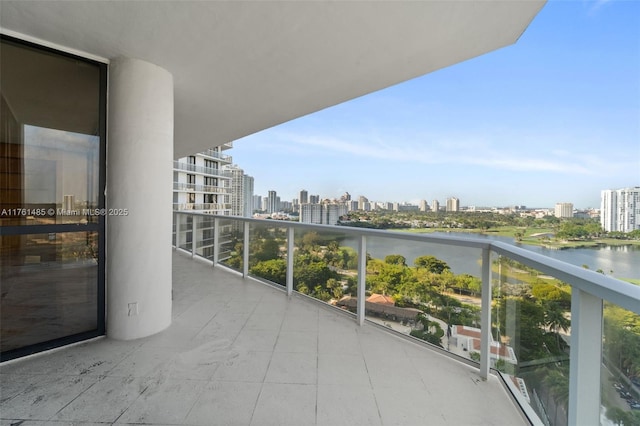 balcony with a city view and a water view