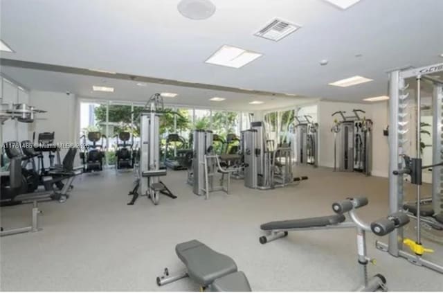 exercise room featuring visible vents