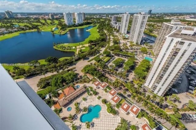 bird's eye view featuring a city view and a water view