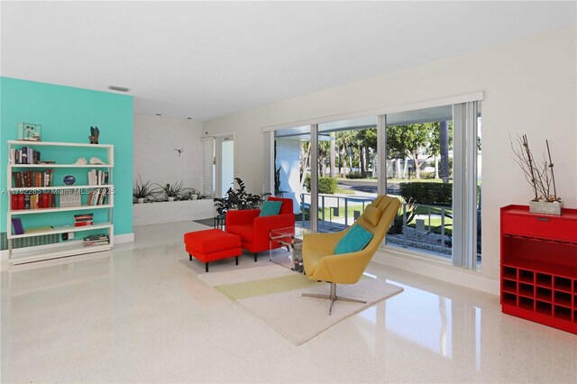 952 Hollywood Blvd, Hollywood, FL 33019 - sitting room with speckled floor and visible vents