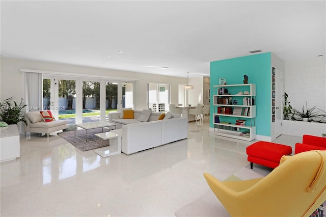 952 Hollywood Blvd, Hollywood, FL 33019 - living room with french doors, visible vents, and speckled floor