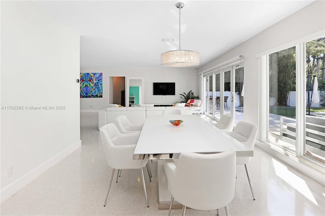 952 Hollywood Blvd, Hollywood, FL 33019 - dining room featuring baseboards and speckled floor
