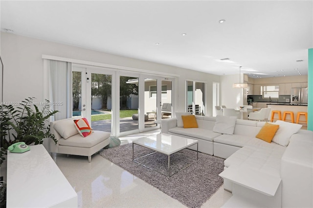 952 Hollywood Blvd, Hollywood, FL 33019 - living room featuring recessed lighting, french doors, and light speckled floor