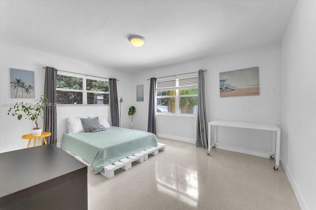 952 Hollywood Blvd, Hollywood, FL 33019 - bedroom featuring speckled floor and baseboards