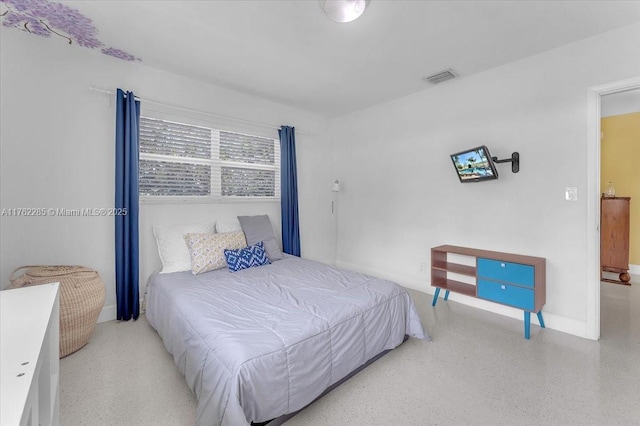 952 Hollywood Blvd, Hollywood, FL 33019 - bedroom with visible vents, speckled floor, and baseboards