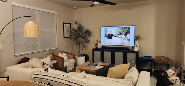 living area with ceiling fan