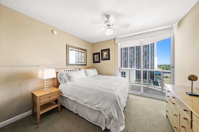 bedroom with a ceiling fan, baseboards, light colored carpet, and floor to ceiling windows