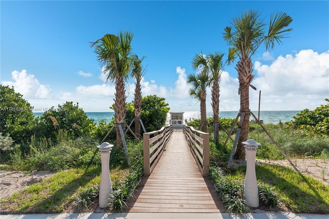 surrounding community featuring a water view