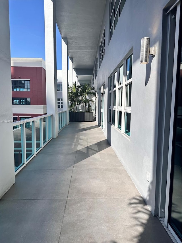 view of patio with a balcony