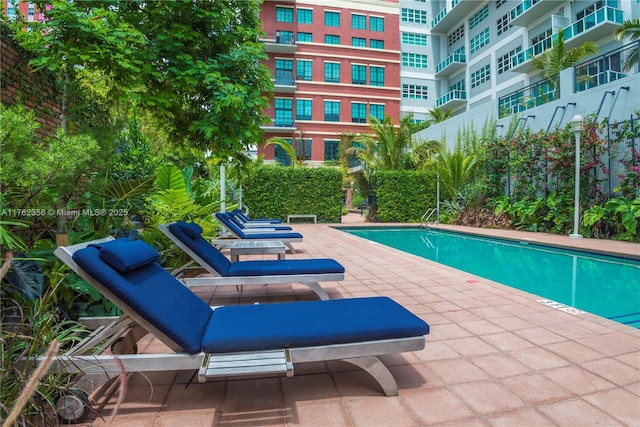 community pool featuring a patio