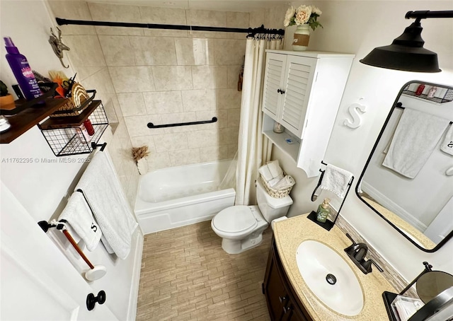 full bathroom featuring shower / tub combo with curtain, toilet, vanity, and brick patterned floor