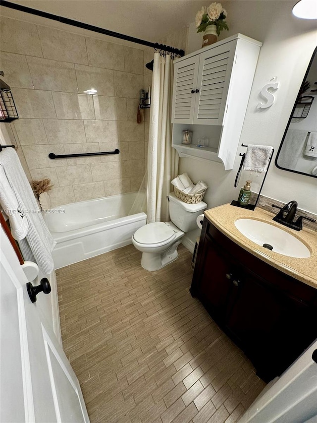 bathroom featuring toilet, vanity, and shower / bath combo