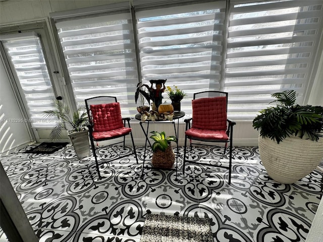 interior space featuring baseboards