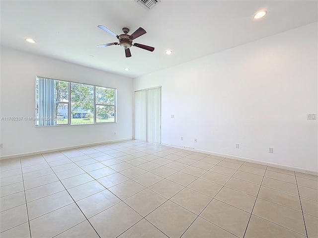 2217 SW Newport Isles Blvd, Port St Lucie, FL 34953 - spare room with ceiling fan, light tile patterned floors, and recessed lighting