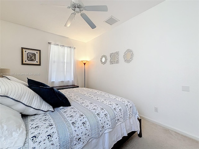 bedroom with visible vents, baseboards, carpet, and a ceiling fan