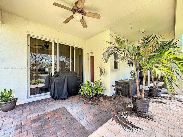 view of patio / terrace featuring grilling area and ceiling fan