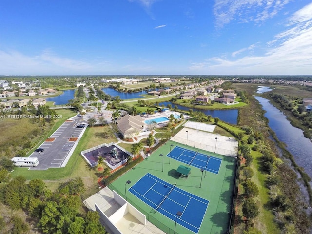 2217 SW Newport Isles Blvd, Port St Lucie, FL 34953 - aerial perspective of suburban area featuring a nearby body of water