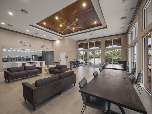 2217 SW Newport Isles Blvd, Port St Lucie, FL 34953 - building lobby featuring a high ceiling, crown molding, and recessed lighting