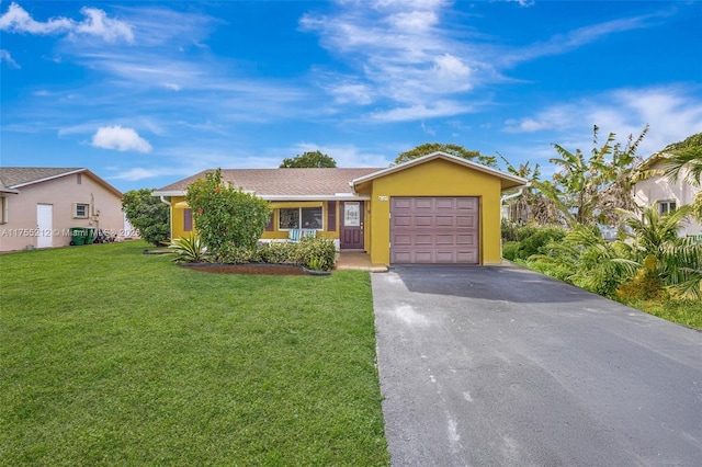 single story home with stucco siding, driveway, an attached garage, and a front lawn