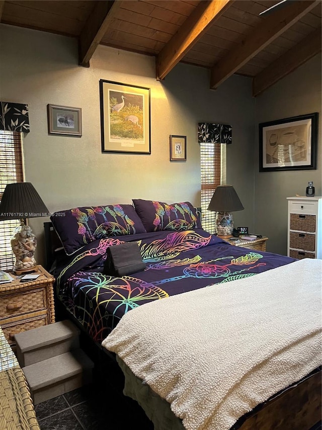 bedroom with wooden ceiling and vaulted ceiling with beams