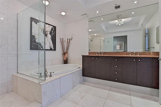 bathroom featuring tile patterned floors, visible vents, a shower stall, double vanity, and a bath