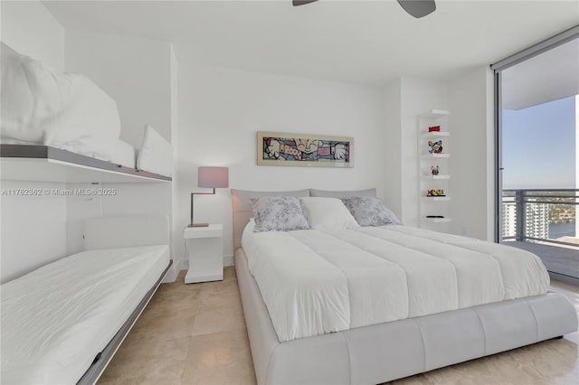 bedroom featuring a wall of windows