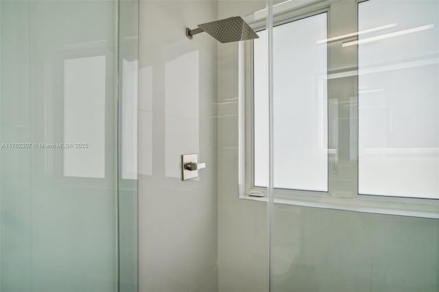 bathroom with a shower stall