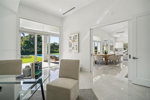 sitting room featuring recessed lighting, visible vents, and baseboards