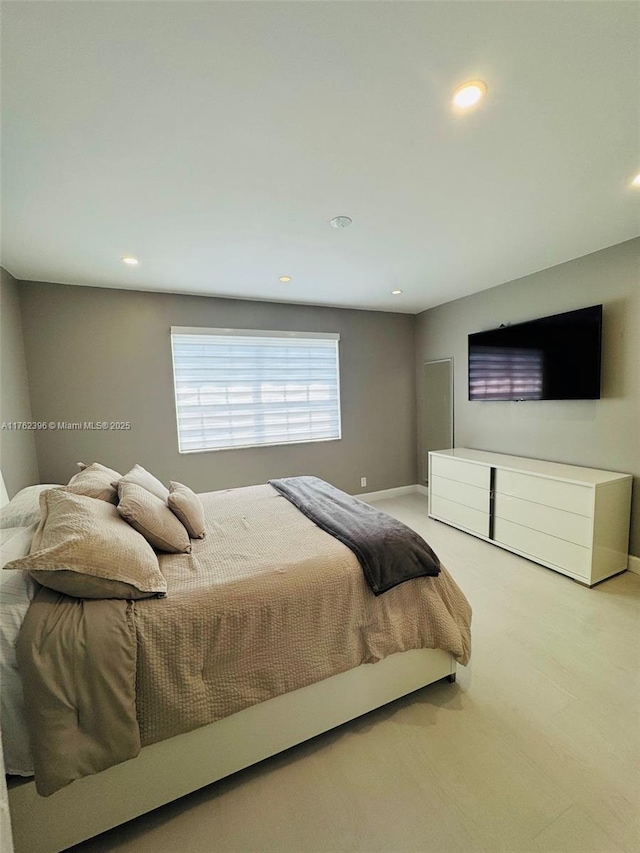 bedroom with recessed lighting, baseboards, and carpet flooring