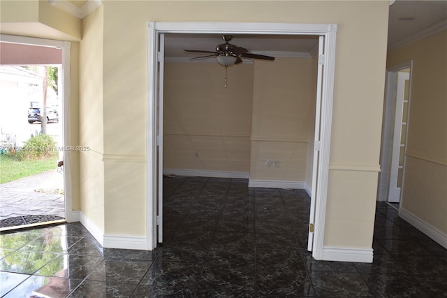 hallway with crown molding and baseboards