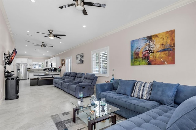 living room with recessed lighting, ornamental molding, and ceiling fan