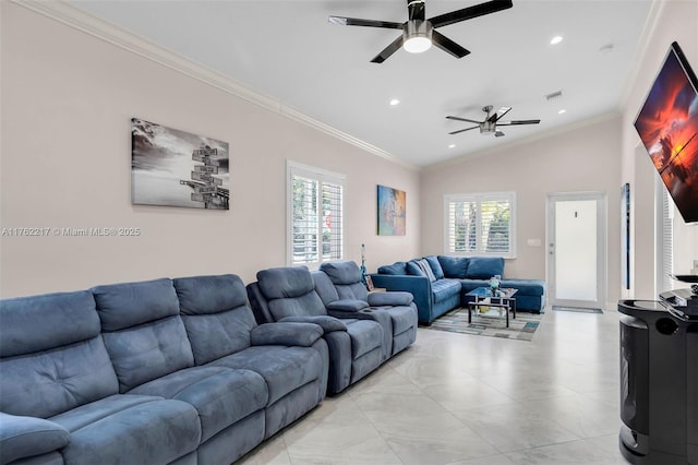 living area with lofted ceiling, a ceiling fan, visible vents, and ornamental molding