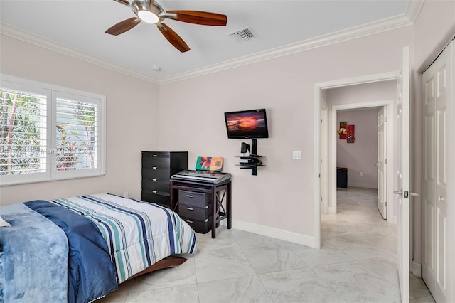 bedroom with baseboards, visible vents, a closet, and ornamental molding