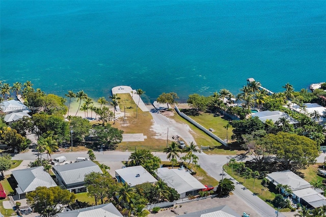 bird's eye view with a water view and a residential view