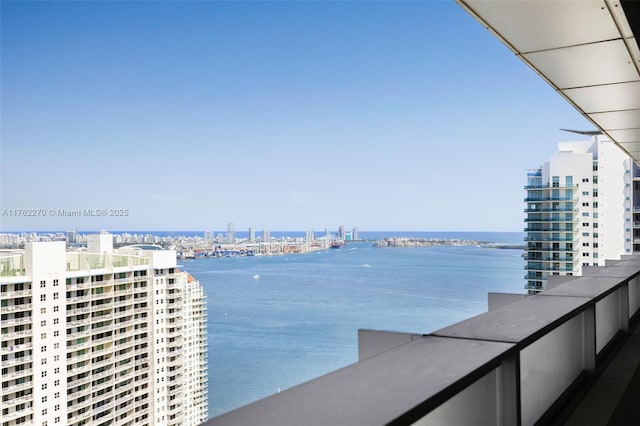 view of water feature with a city view