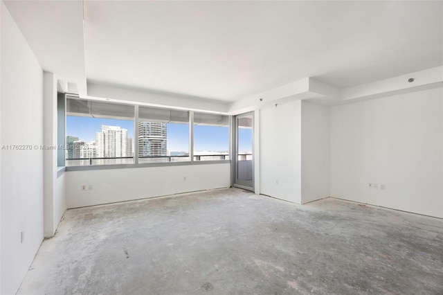 1395 Brickell Ave Unit 3411, Miami, FL 33131 - unfurnished room with a city view and concrete flooring