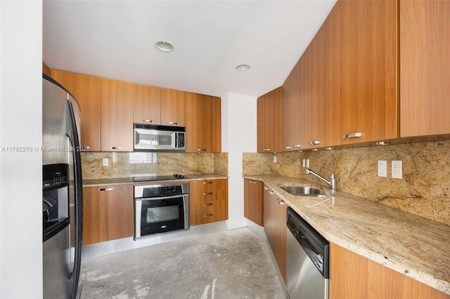 1395 Brickell Ave Unit 3411, Miami, FL 33131 - kitchen featuring a sink, modern cabinets, brown cabinetry, and stainless steel appliances
