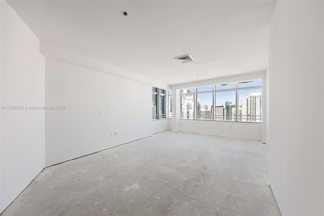 1395 Brickell Ave Unit 3411, Miami, FL 33131 - spare room with a city view and visible vents