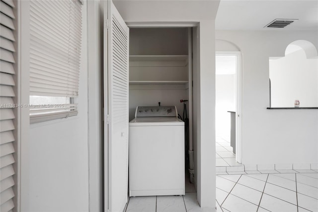 laundry room with washer / dryer, visible vents, marble finish floor, and laundry area