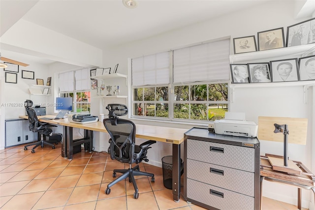 home office with light tile patterned flooring